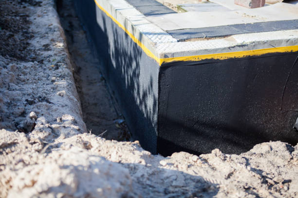 Professional Waterproofing technician working in Hartford, TN